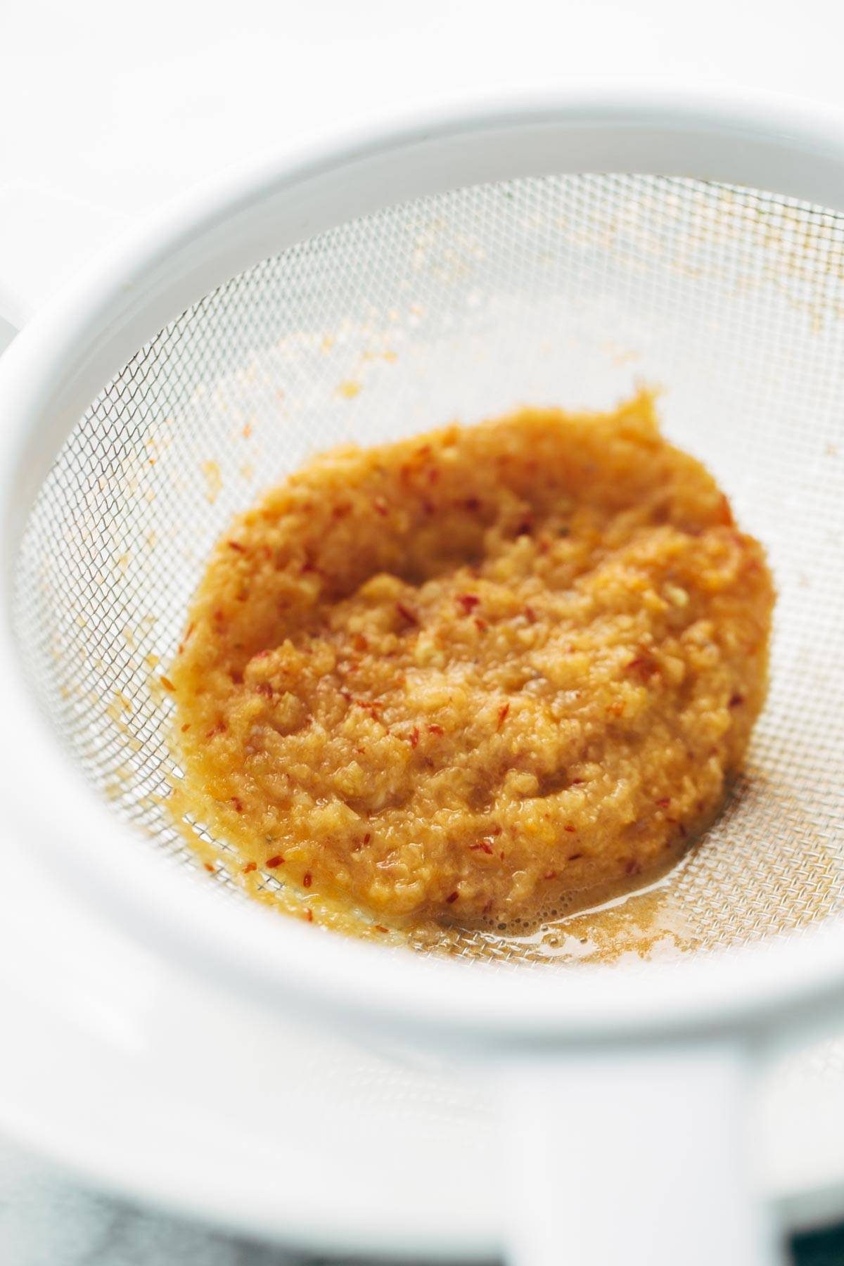 Homemade Spicy Ramen recipe with an easy spicy miso paste for the broth and dry ramen noodles that taste JUST like fresh! Vegetarian / vegan. | pinchofyum.com